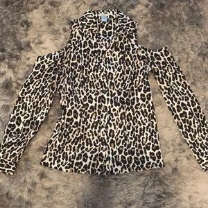 Open shoulder button down shirt.